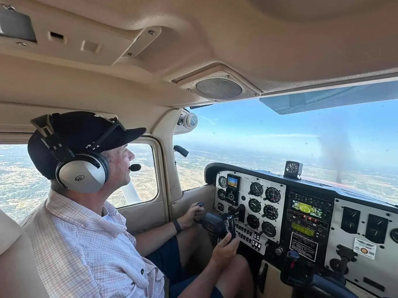 A student pilot at Bird Dog Flight Services in the cockpit during career training