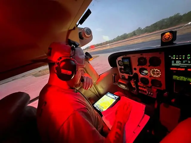 Student pilot conducting night flight and instrument training